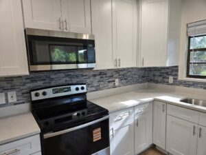 Remodeled kkitchen at Deland FL home for single moms with child by the More Doors Foundation and Homeless 2 Home