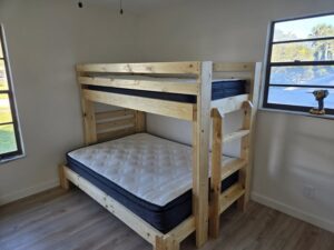 Bunkbeds for a homeless mom and child at Florida More Doors Foundation by Homeless @ Home